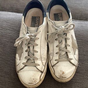 Women’s golden goose good condition size 38 has a small hole by toe